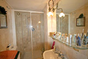 The beautiful bathroom in Roman travertine