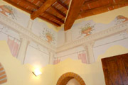 Florenz Unterkunft: Wohnzimmer mit Freskomalerei der Unterkunft Giotto in Florenz