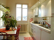 Dwelling Florence: Kitchen with table of Filarete Dwelling in Florence